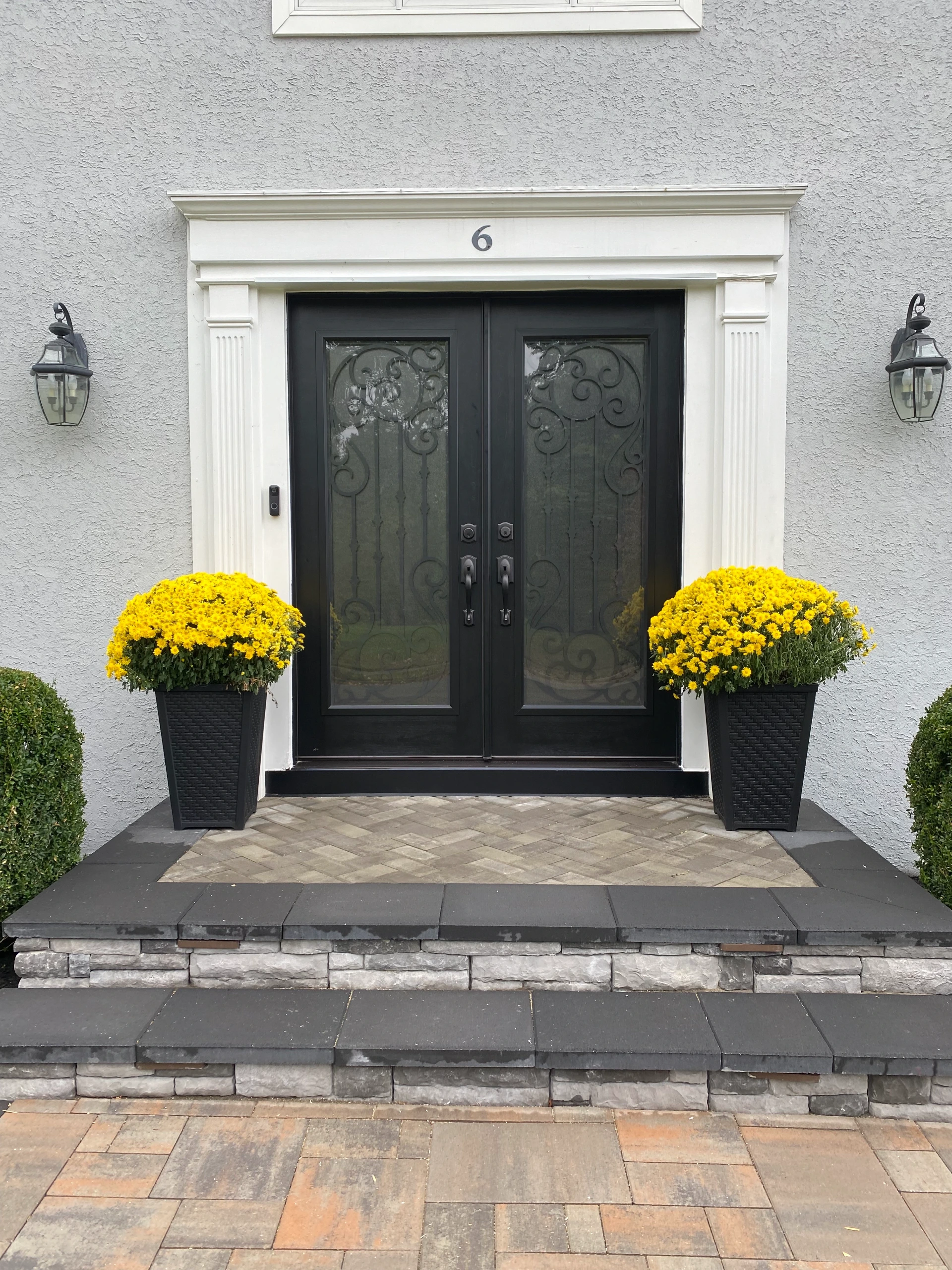 double-black-doors-with-ornamental-windows